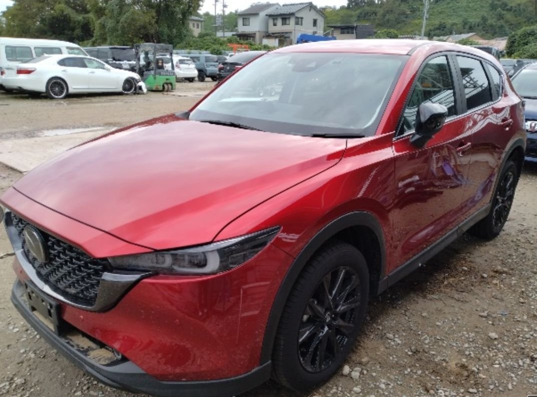 Red Mazda CX-5 seen from the front left