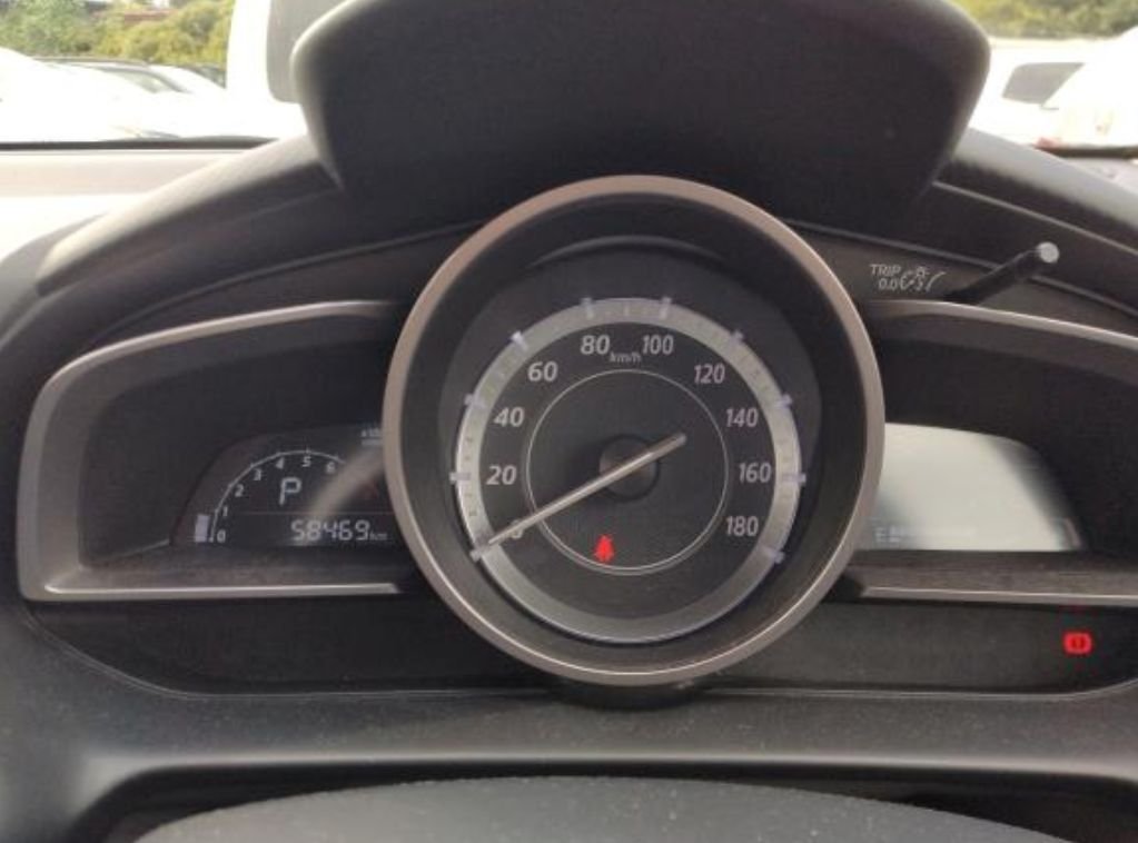 Instrument cluster showing 58,469 km