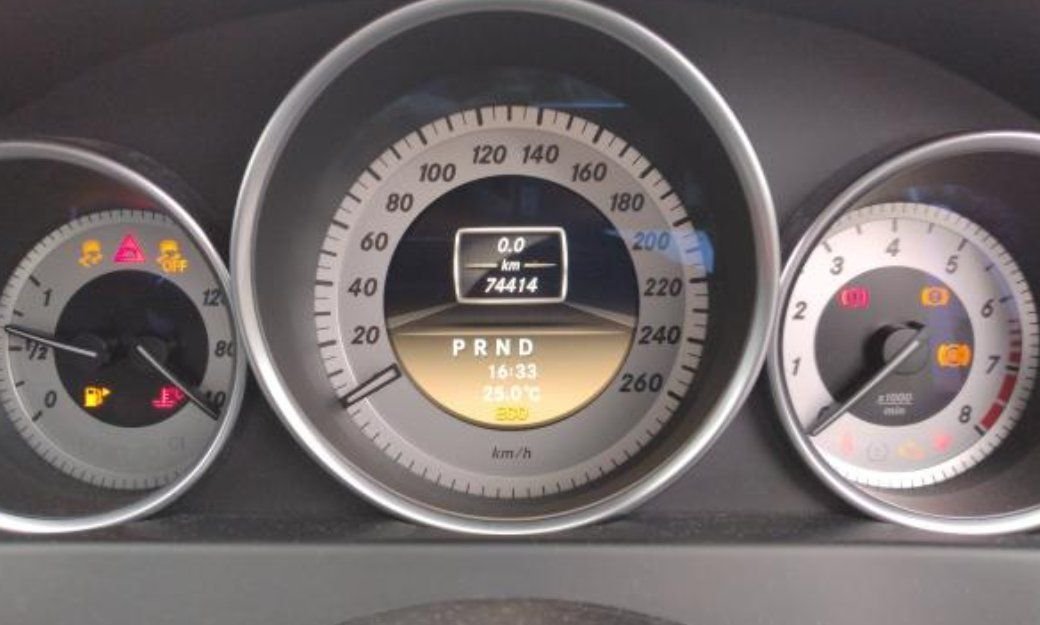 Instrument cluster showing 74,414 km