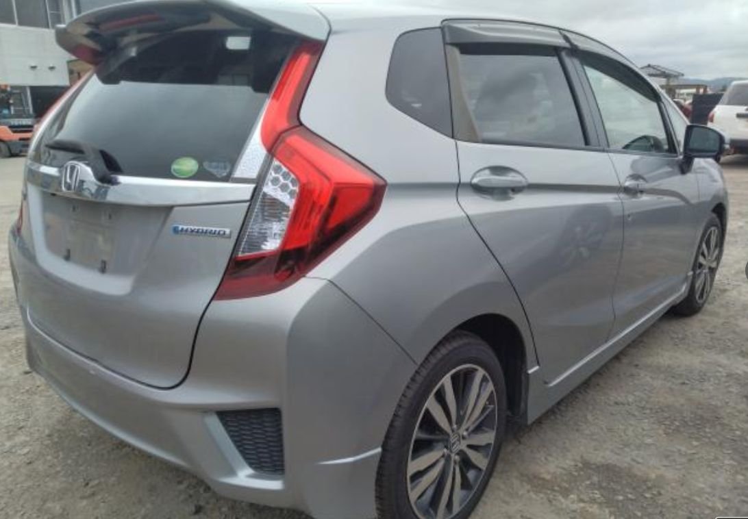 Rear right of the Honda Fit Hybrid with the hybrid badge