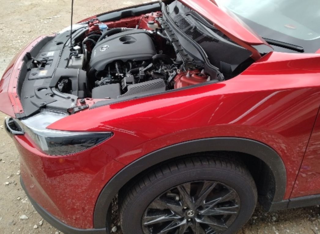Front right of the Mazda CX-5 with the bonnet open