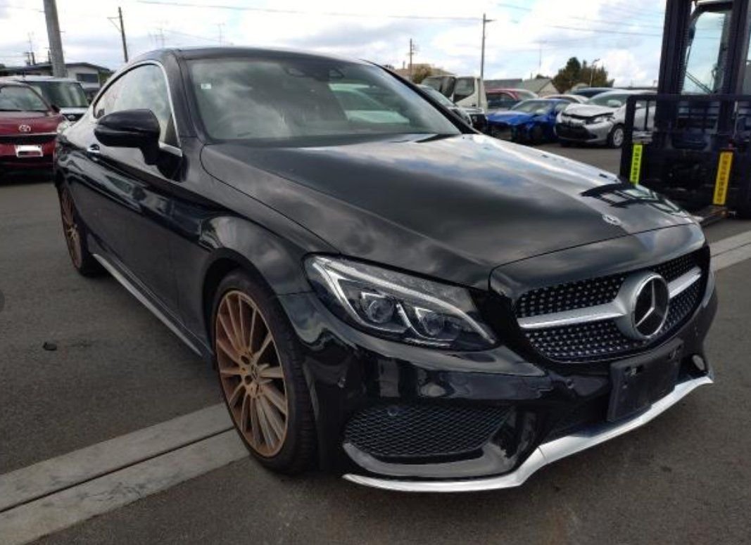 Black Mercedes-Benz C180 Coupe seen from the front right
