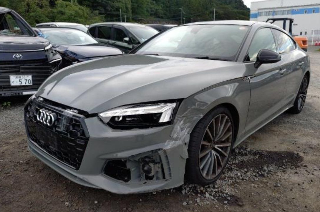 Front left of the A5 showing the damaged bumper corner