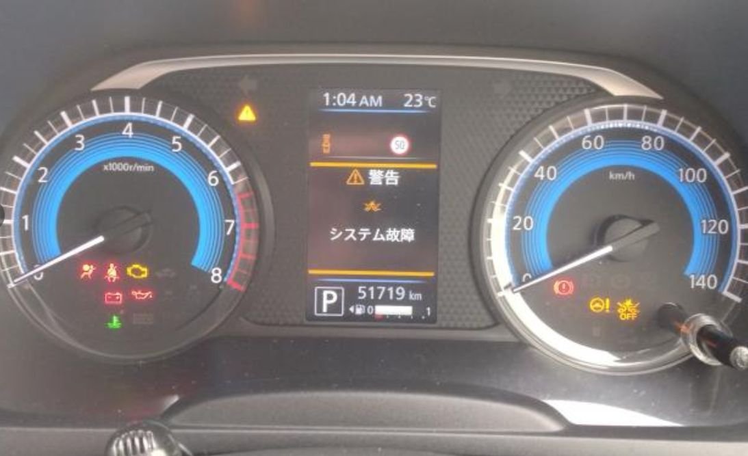 Instrument cluster showing 51,719 km and a system fault warning