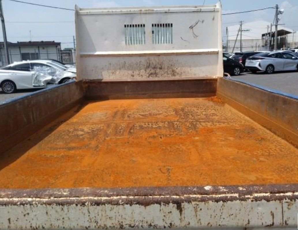 Rusted floor of the dump body
