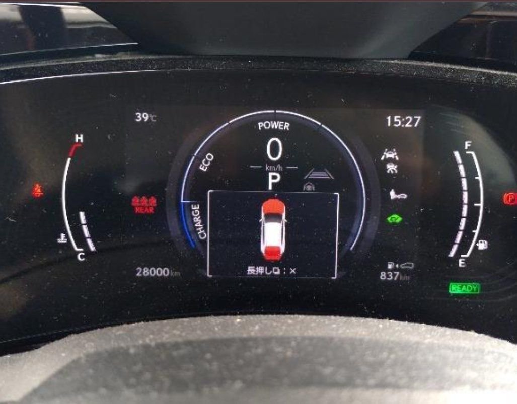 Digital instrument cluster showing 28,000 km