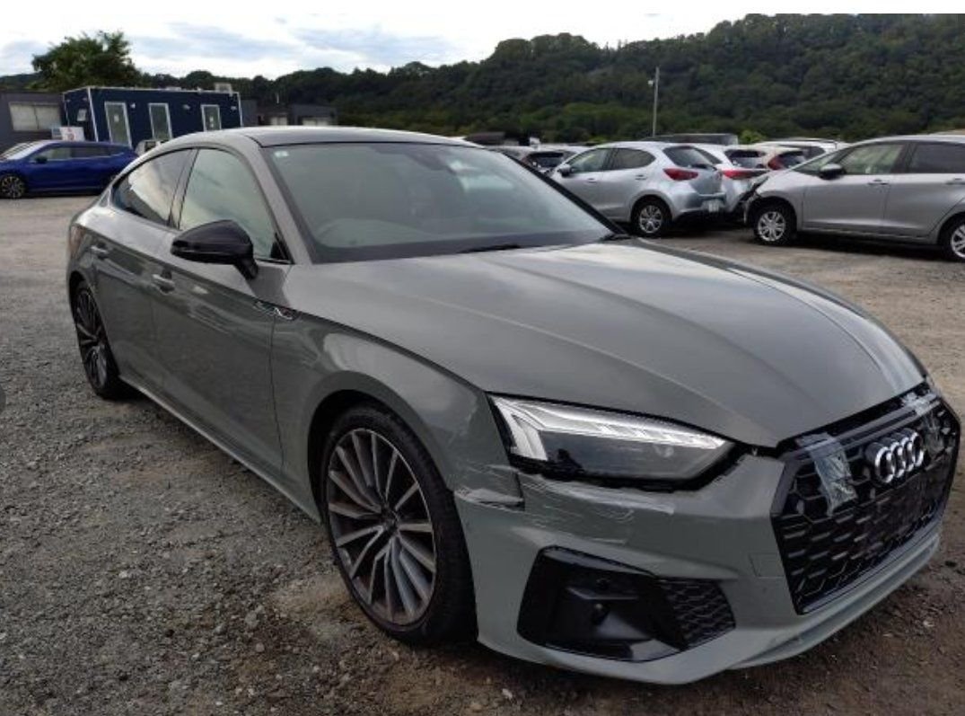 Grey Audi A5 Sportback seen from the front right, showing front-end damage