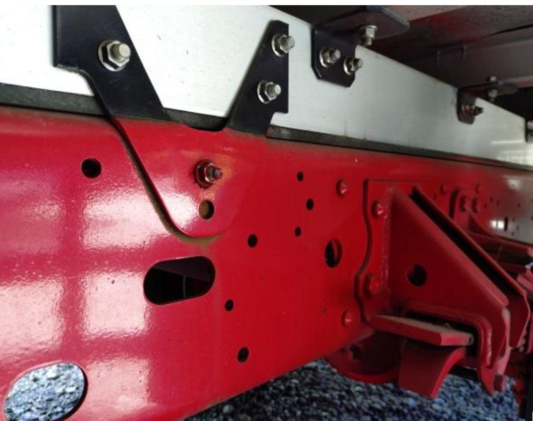 Chassis frame and deck mounting brackets