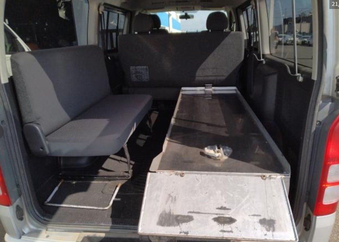 Rear seats and fitted steel storage box in the load area