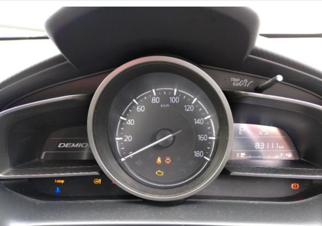 Instrument cluster showing 83,111 km