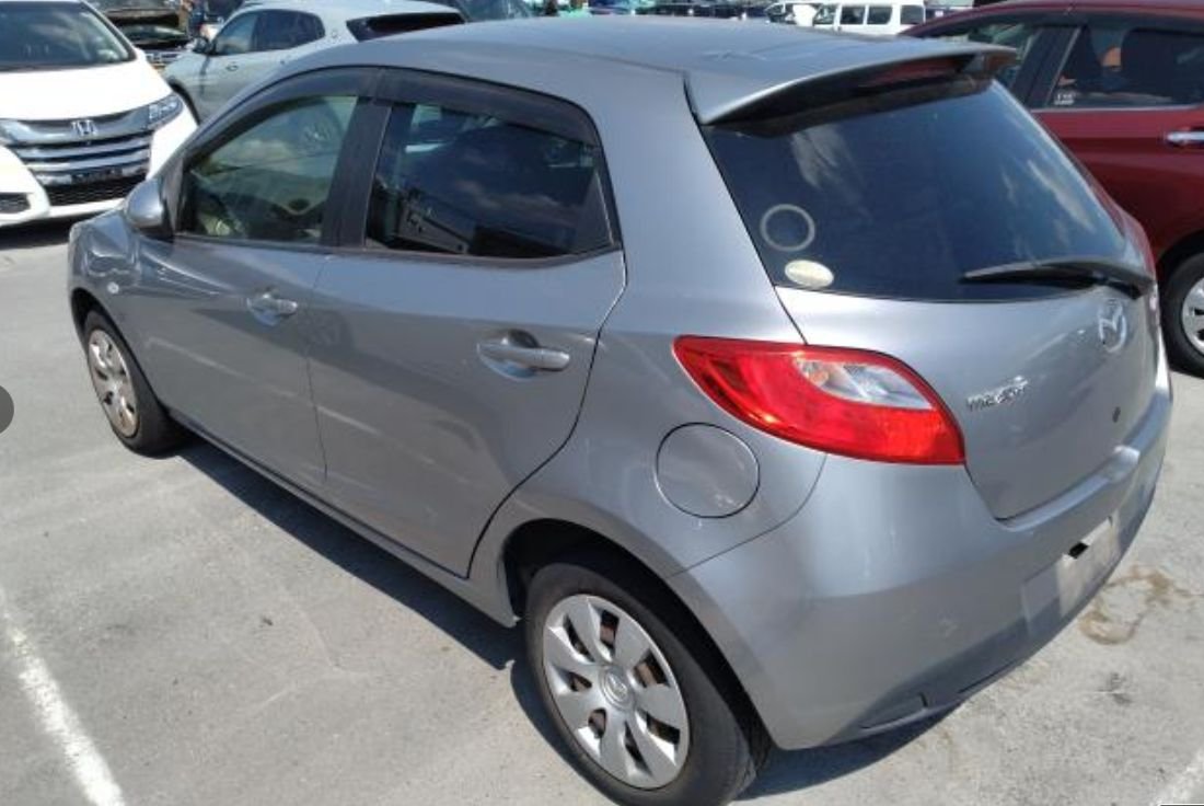 Rear left of the Mazda Demio