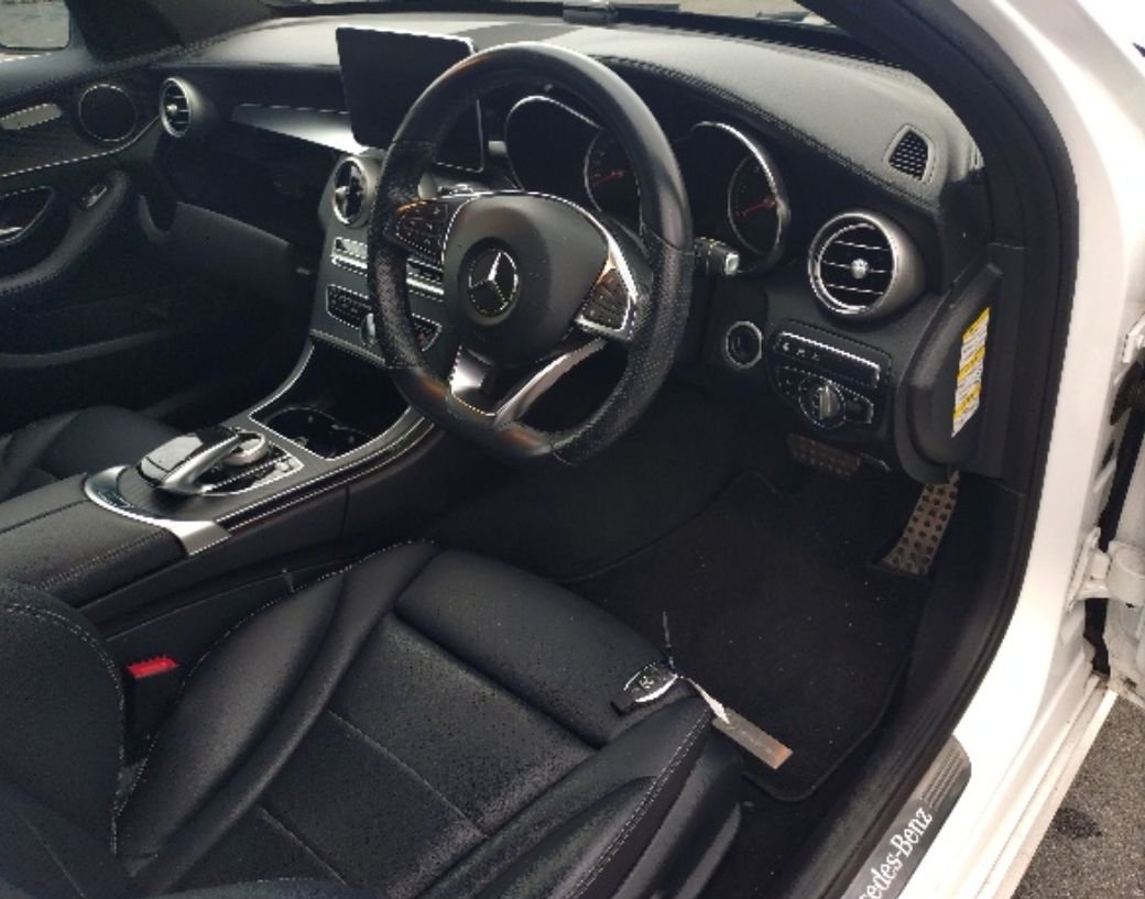 Right-hand-drive interior with black leather seats